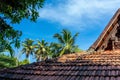 Punnamada Resort, Alappuzha, Kerala, India - 19.01.2023: Carving wood gable roof on a resort hotel in India, Alappuzha