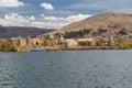 Puno, Peru - circa June 2015: Uros floating island and village on Lake Titicaca near Puno, Peru Royalty Free Stock Photo