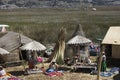 Puno, Peru Traditional Totora boat with tourists on Lake Titicaca near the floating islands of Uros, Puno, Peru, Royalty Free Stock Photo