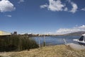 Puno, Peru Traditional Totora boat with tourists on Lake Titicaca near the floating islands of Uros, Puno, Peru, Royalty Free Stock Photo