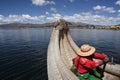 Puno Peru Lake Titicaca with Totoras Island with women from the Uros culture with their typical clothes and straw hats