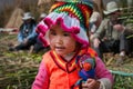 PUNO, PERU - OCTOBER 13, 2016: small peruvian latino child girl dressed in traditional native Peruvian clothes