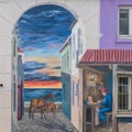 Wall mural of alley on building in Punta Arenas in Chile