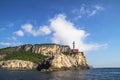 Punta Carena Lighthouse on the coastal rocks in Capri island Royalty Free Stock Photo
