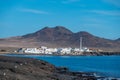 Punta de Jandia and lighthouse on southern end of Fuerteventura island, accessible only by gravel road Royalty Free Stock Photo