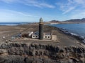 Punta de Jandia and lighthouse on southern end of Fuerteventura island, accessible only by gravel road Royalty Free Stock Photo