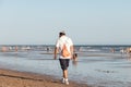 Punta Umbria, Huelva, Spain - August 2, 2020: Beach safety guard of Junta de Andalucia is controlling the social distancing and