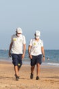 Punta Umbria, Huelva, Spain - August 7, 2020: Beach safety guard of Junta de Andalucia is controlling the social distancing and