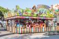 Punta Umbria, Huelva, Spain - July 10, 2020: Fairground attraction in the street Calle Ancha of Punta Umbria village, Spain