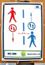 Punta Umbria, Huelva, Spain - July 10, 2020: Poster on a pole with the rules for pedestrian circulation to respect social