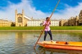 Punting boat on the river Cam and King\'s College Chapel in Cambridge, UK Royalty Free Stock Photo