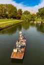 Punting boat on the river Cam in a sunny day in Cambridge, UK Royalty Free Stock Photo