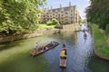 Punting canals Cambridge England. tourists