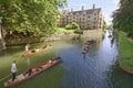 Punting canals Cambridge England. tourists