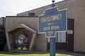 Punxsutawney town sign with Phil dressed as Fireman Royalty Free Stock Photo