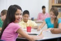 Pupil in elementary school classroom Royalty Free Stock Photo