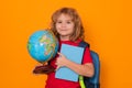 Pupil, nerd schoolboy. School kid portrait. Schoolboy with world globe and book. School child student with backpack Royalty Free Stock Photo