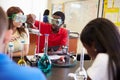 Pupils Carrying Out Experiment In Science Class Royalty Free Stock Photo