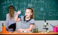 Pupils at chalkboard chemistry lesson. Laboratory practice. Chemistry classes. Fascinating science. Educational Royalty Free Stock Photo