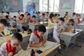 Pupils on chinese traditional calligraphy lesson