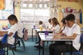 Pupils in a lesson at a primary school classroom, side view Royalty Free Stock Photo