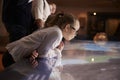 Pupils On School Field Trip To Museum Looking At Map Royalty Free Stock Photo