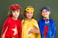 Pupils in superhero costumes