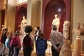 Pupils And Teacher On School Field Trip To Museum With Guide Royalty Free Stock Photo