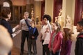 Pupils And Teacher On School Field Trip To Museum With Guide Royalty Free Stock Photo