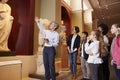 Pupils And Teacher On School Field Trip To Museum With Guide Royalty Free Stock Photo