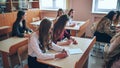 Pupils of the 11th grade in the class at the desks during the lesson. Russian school. Royalty Free Stock Photo