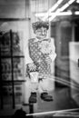 A Puppet Of An Old Woman Hangs In a Shop Window, Prague Royalty Free Stock Photo
