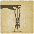 Puppet standing on hands upside down vintage background