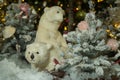 Puppet white bears sit in a fairy snowy forest. Christmas installation Royalty Free Stock Photo