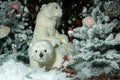 Puppet white bears sit in a fairy snowy forest. Christmas installation Royalty Free Stock Photo