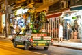 Puppets of crockets on a pick up truck on Tel Aviv street at night for advertisement