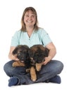 Puppies german shepherd and woman