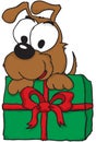 Puppy holding a Christmas present Royalty Free Stock Photo
