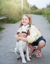 Puppy labrador retriever and little girl Royalty Free Stock Photo