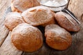 Pupular street food Bunuelos sprinkled with powdered sugar close-up. horizontal Royalty Free Stock Photo