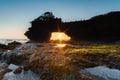 Pura Batu Bolong rock hole on sunset. Royalty Free Stock Photo