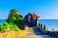 Pura Batu Bolong is the traditional Balinese temple located on a rocky, in the Tanah Lot area, Bali, Indonesia Royalty Free Stock Photo