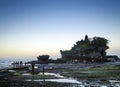 Pura Goa Lawah hindu temple sunset silhouette in bali indonesia