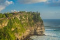 Pura Luhur Uluwatu temple, Bali, Indonesia. Amazing landscape - cliff with blue sky and sea Royalty Free Stock Photo