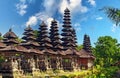 Pura Taman Ayun Temple, Bali - View on traditional meru towers in a row of balinese hindu temple with multiple thatched roofs ,