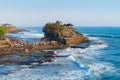 Pura Tanah Lot, the water temple, in Bali at noon. It is one of the most popular of tourist attraction. Indonesia. Nature