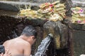 PURA TIRTA EMPUL, BALI, INDONESIA - AUGUST 17, 2016 - Balinese people at the temple for full moon celebration