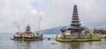 Pura Ulun Danu Bratan, Bali. Hindu temple surrounded by flowers on Bratan lake, Bali. Major Shivaite water temple in Royalty Free Stock Photo