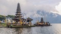 Pura Ulun Danu Bratan, Bali. Hindu temple surrounded by flowers on Bratan lake, Bali. Major Shivaite water temple in Royalty Free Stock Photo