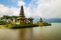 Pura Ulun Danu Bratan temple. Balinese landmark. Water reflection. Slow shutter speed. Bratan lake, Bali, Indonesia Royalty Free Stock Photo